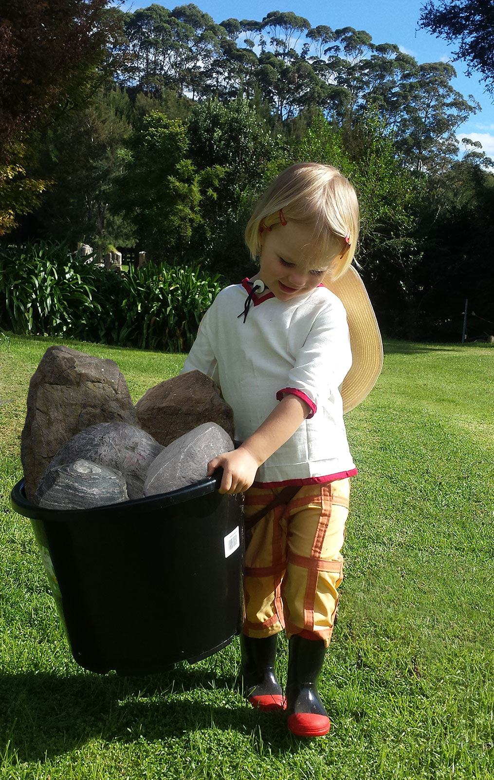 a young Finny (of Black Butler fame) doing some light landscaping.