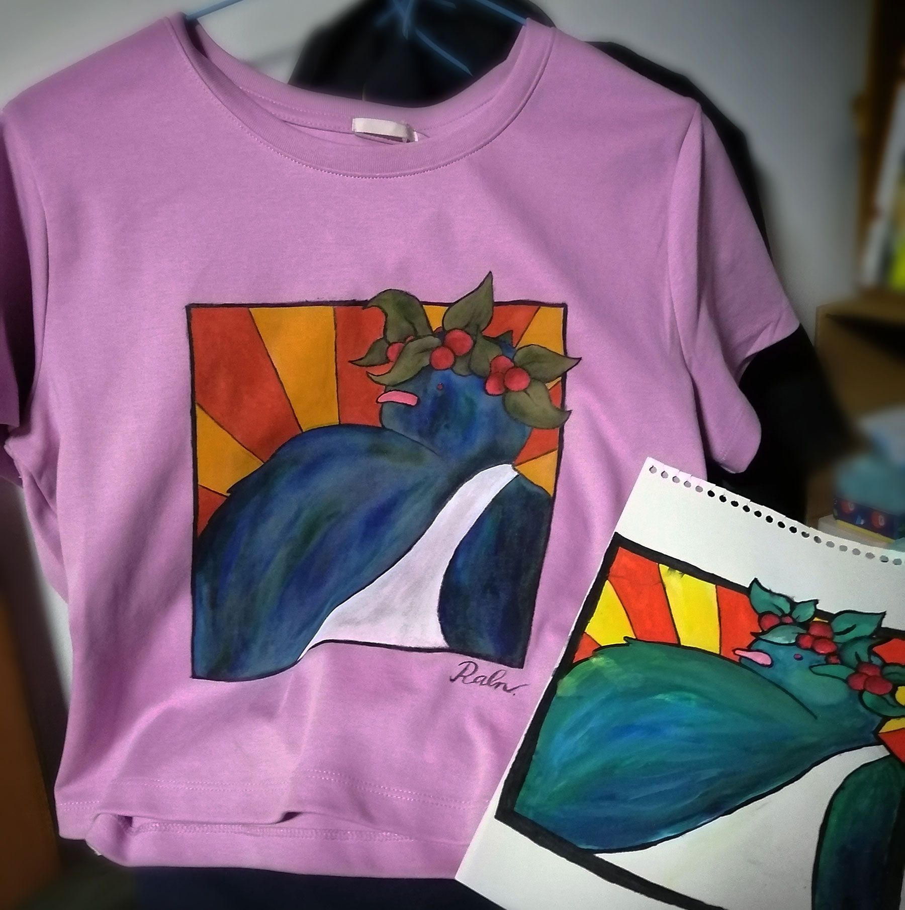 a t-shirt with the previous kereru (Dionysus) image hand-painted on it.